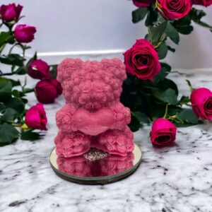 Pillar Candle Teddy Bear Rose on a mirror candle holder